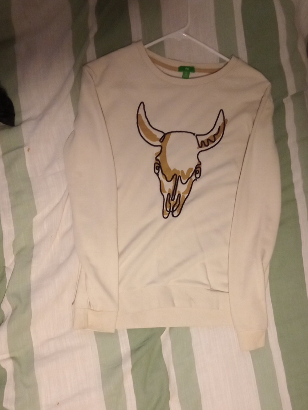 dip Cream Pullover with Green Brand Tag